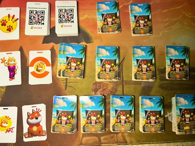 NFC cards and QR code cards laid out in rows on an illustrated table cloth